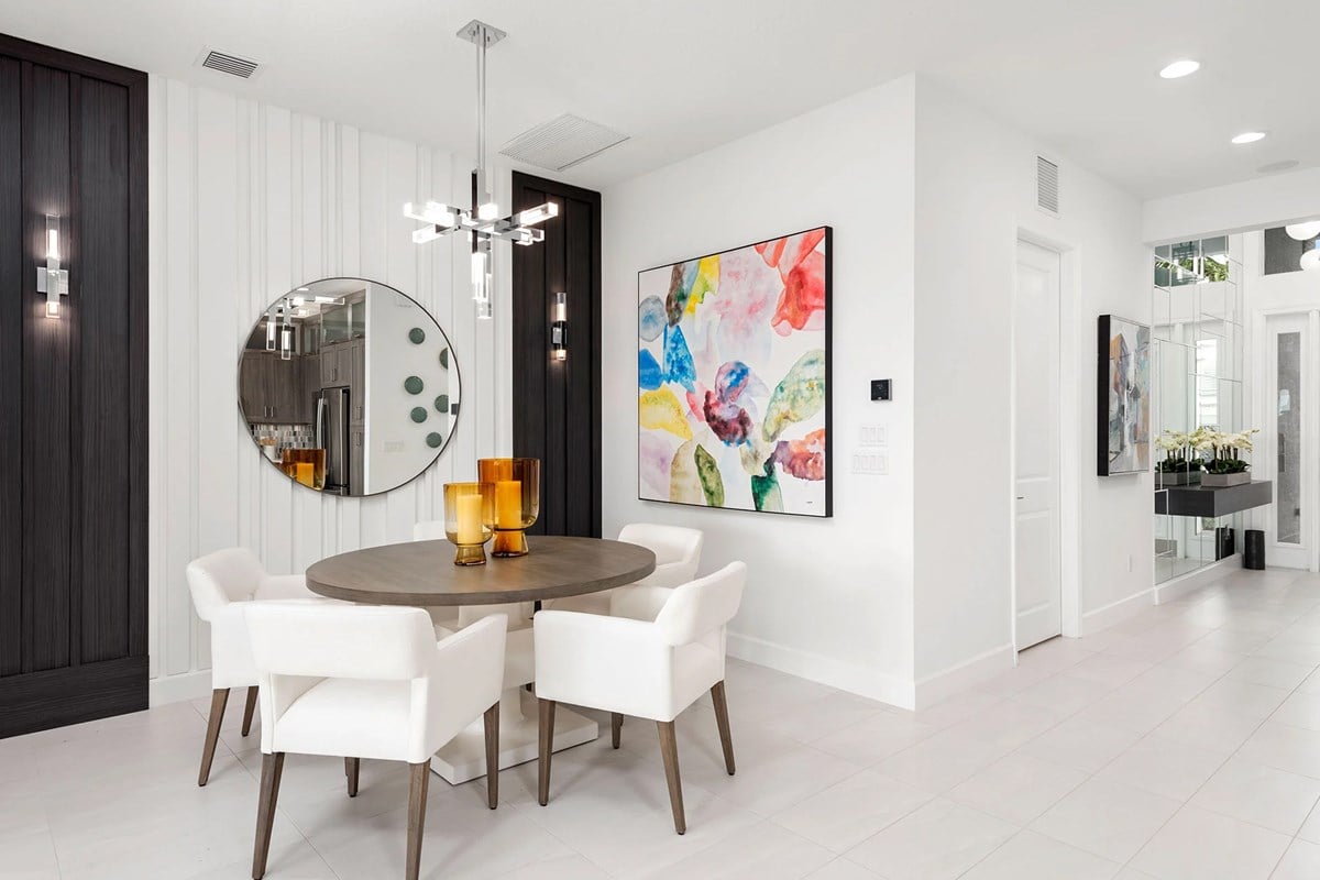 Elegant open-concept dining room inside a home at The Estates at NOMAR West Palm Beach